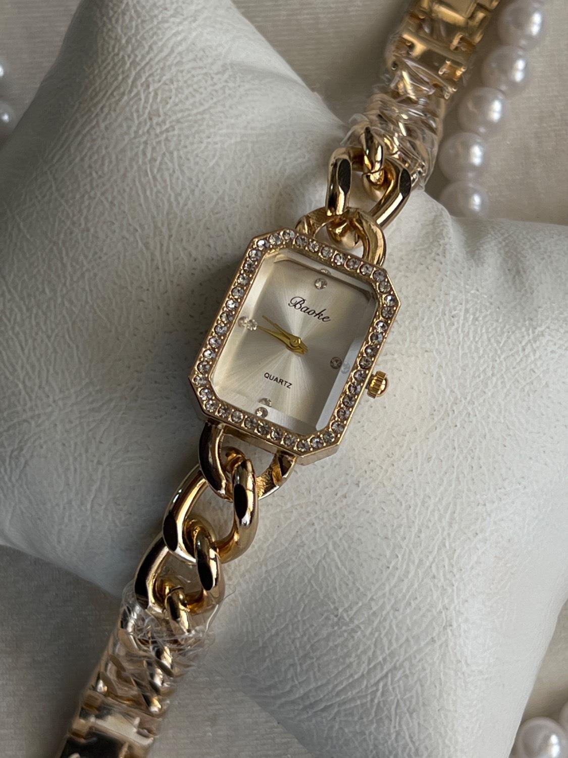 ساعت زنانه بنداستیل طرح کارتیر طلایی صفحه سفید - کد 677